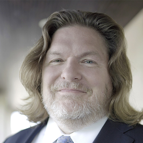 Travis Dunn Background